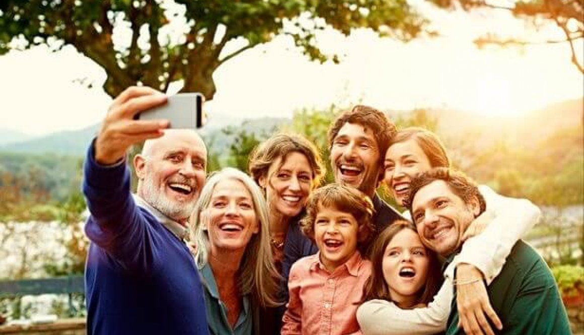 Cheerful family taking selfie